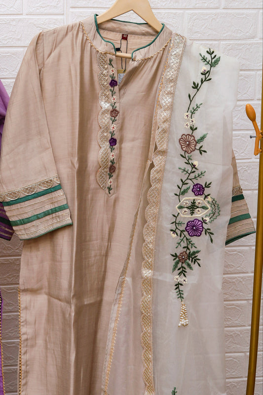 Elegant beige kurti paired with pant and a grand dupatta