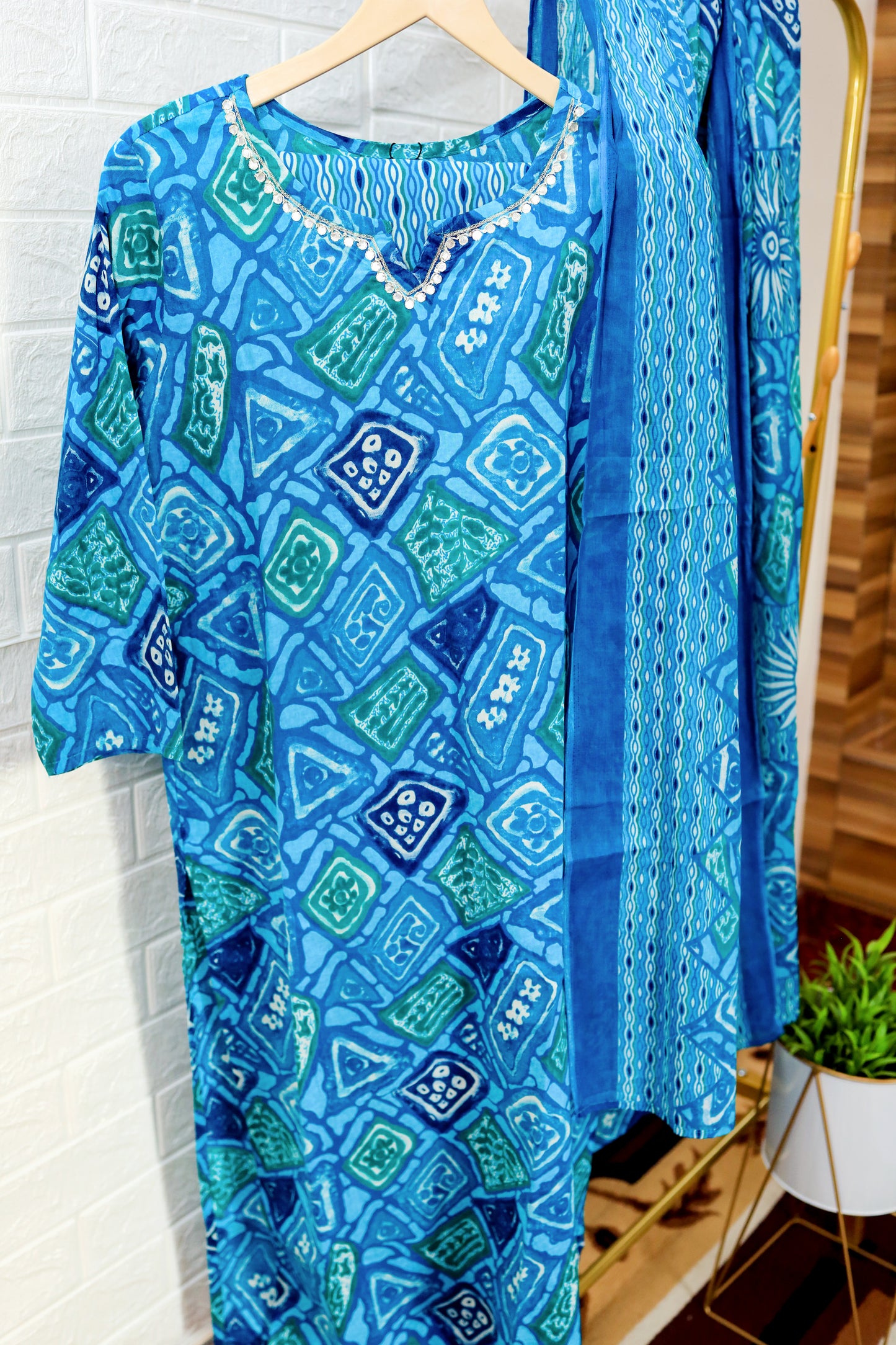A graceful cotton kurti set in a blend of emerald and sage green