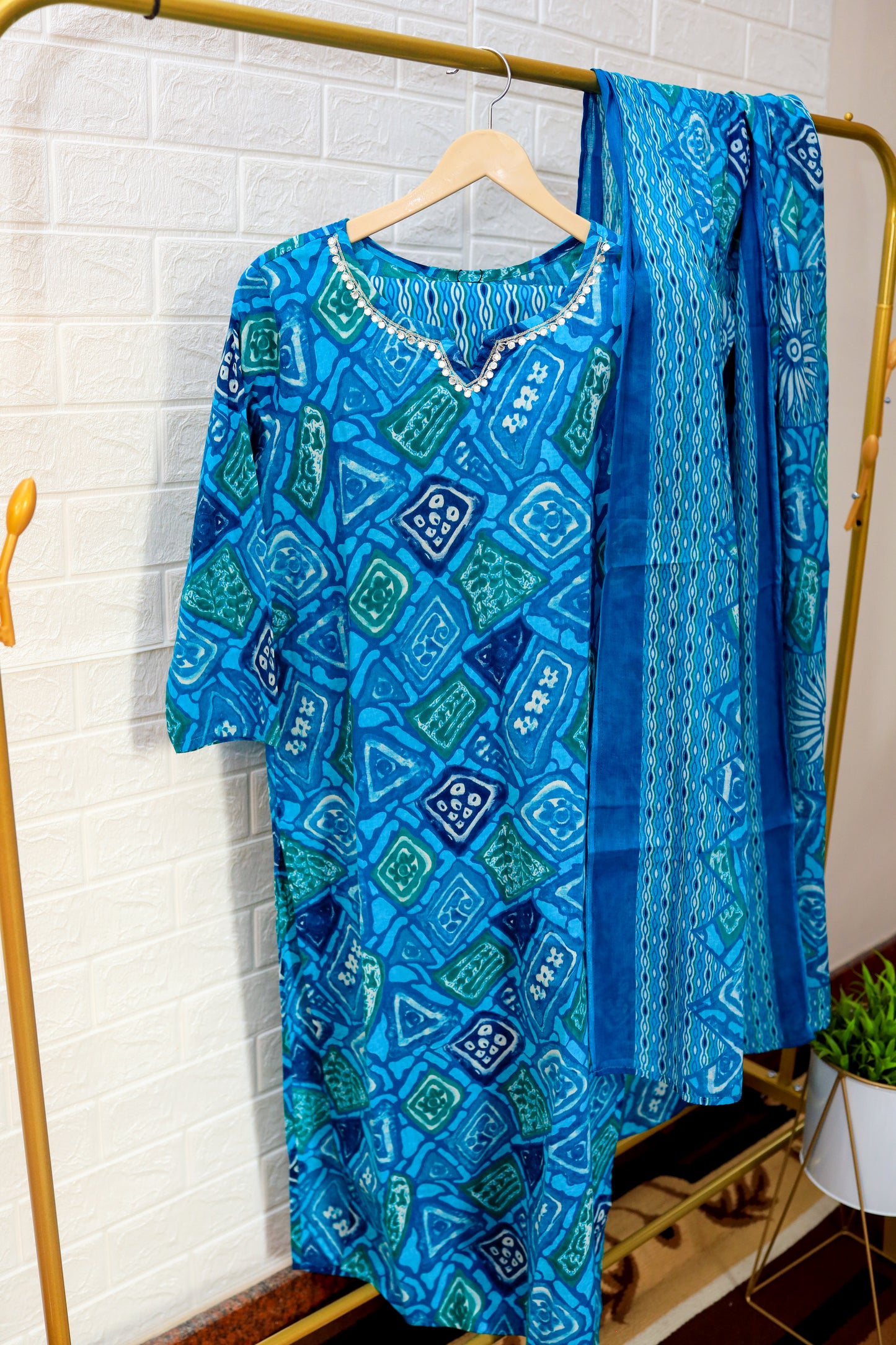 A graceful cotton kurti set in a blend of emerald and sage green