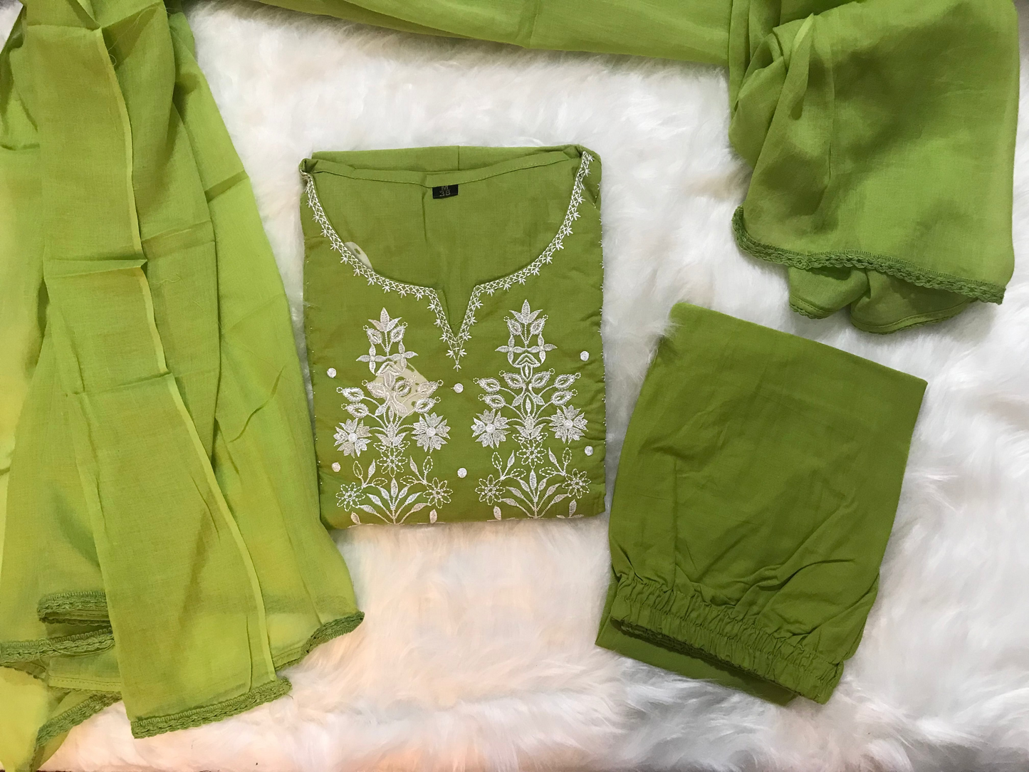 Graceful green suit set with white floral embroidery