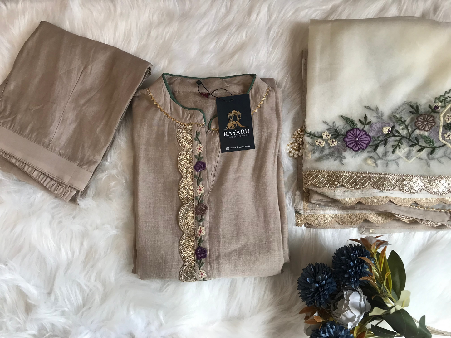 Elegant beige kurti paired with pant and a grand dupatta