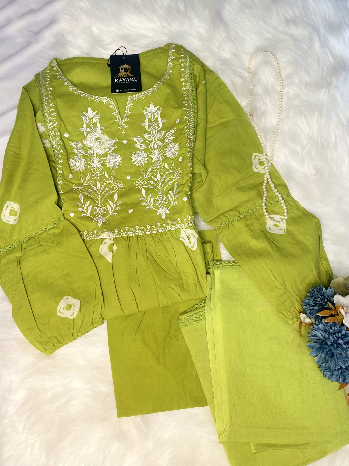 Graceful green suit set with white floral embroidery