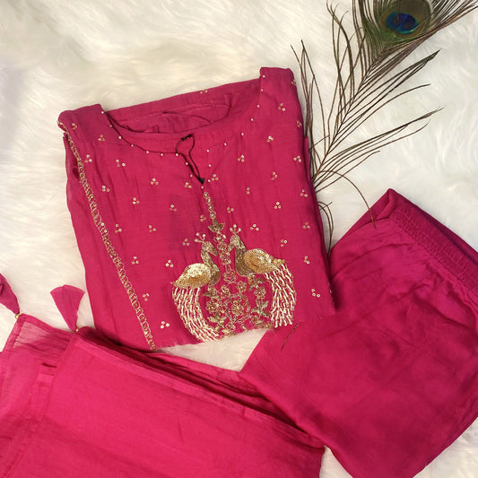 Elegant pink Mul Chanderi kurta with gold peacock embroidery.