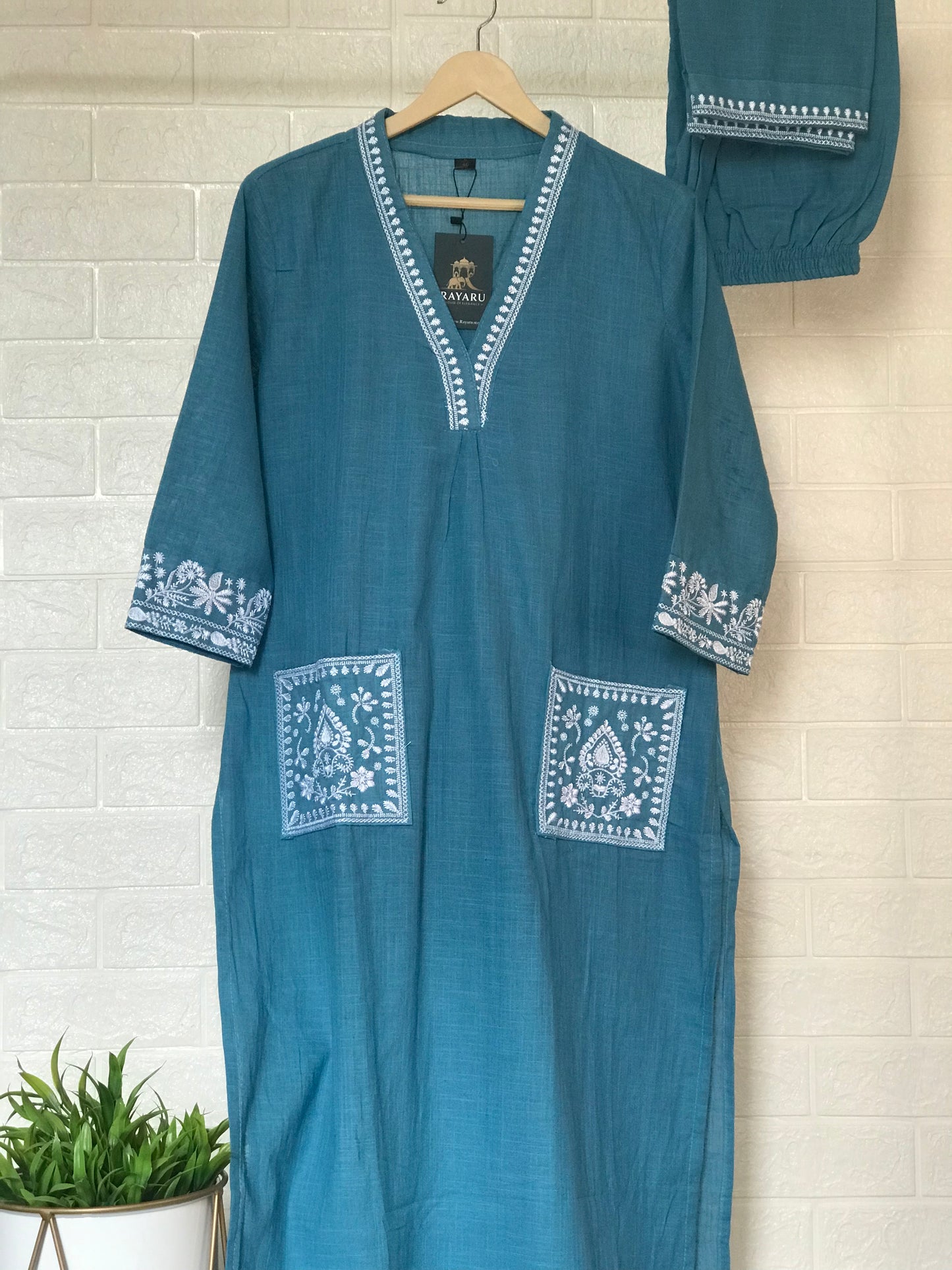 Effortless office chic: Light blue cotton kurti with matching pants.