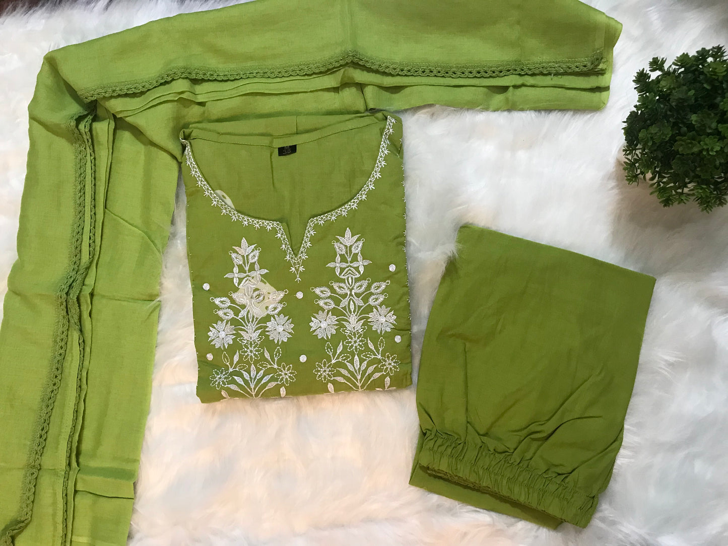 Graceful green suit set with white floral embroidery