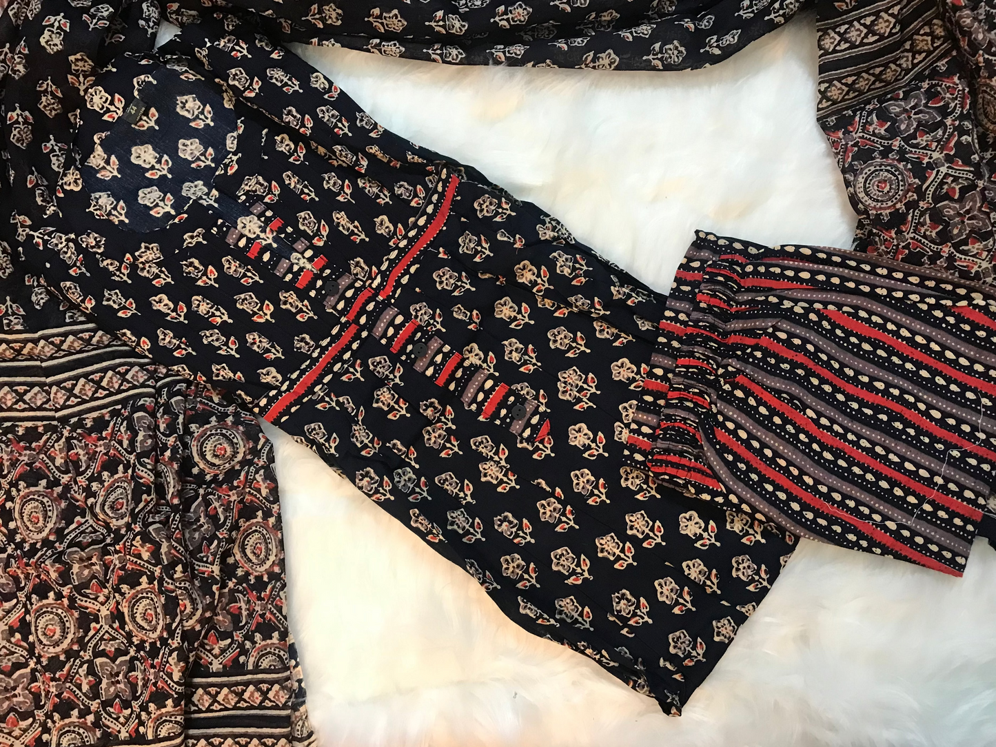 A timeless black floral ensemble for work and casual wear.