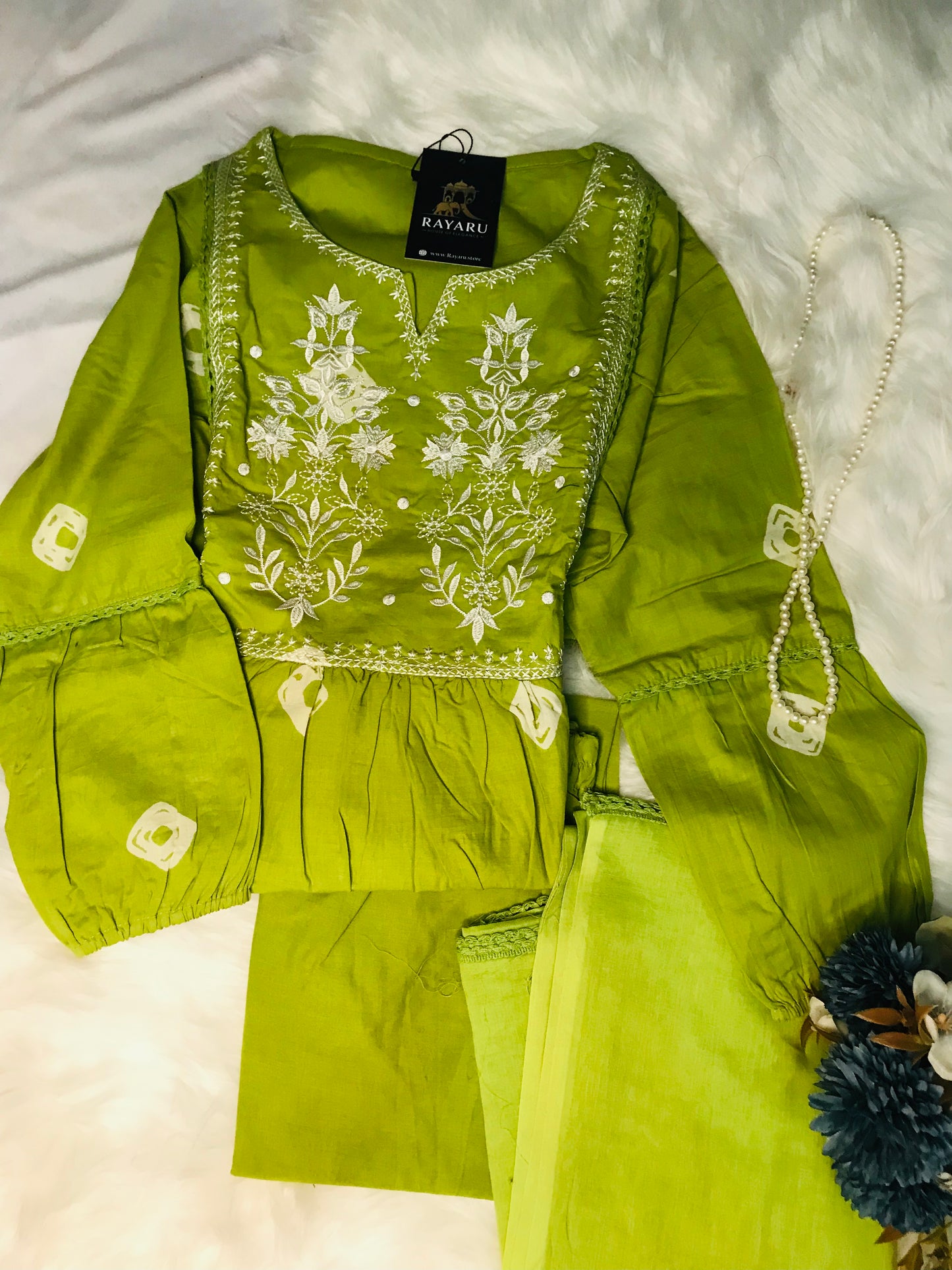 Graceful green suit set with white floral embroidery