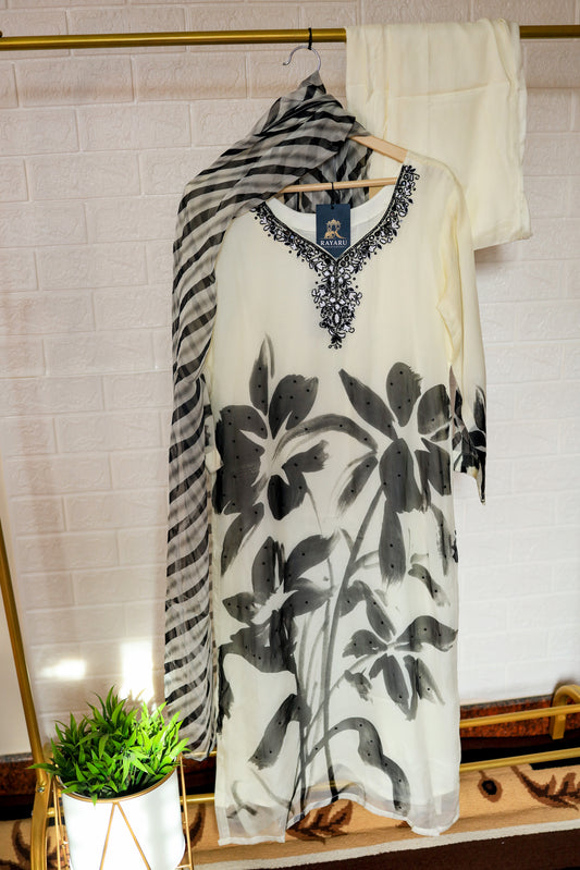 Elegant white organza kurta featuring intricate black embroidery