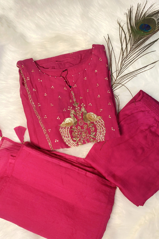 Elegant pink Mul Chanderi kurta with gold peacock embroidery.