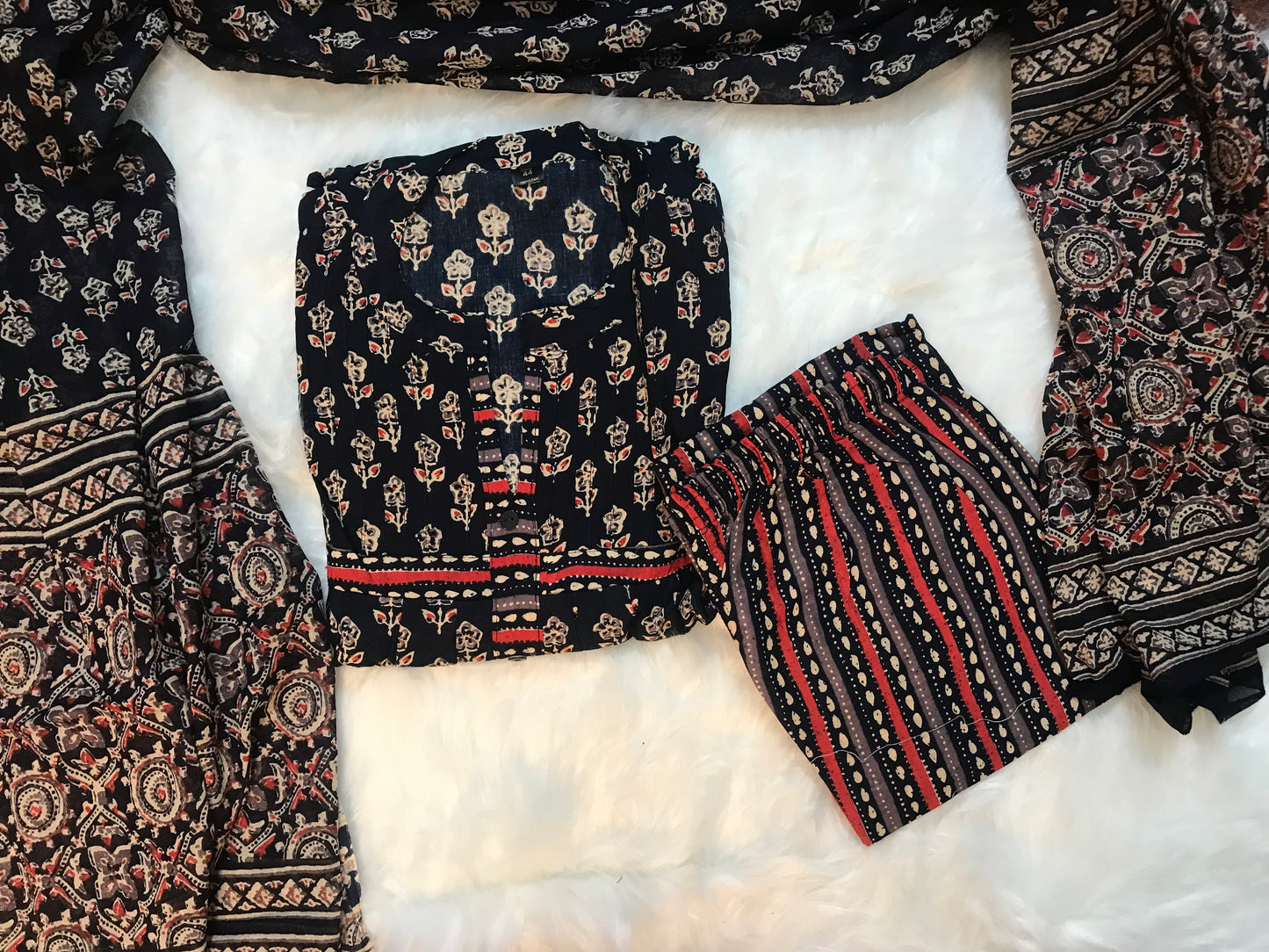 A timeless black floral ensemble for work and casual wear.